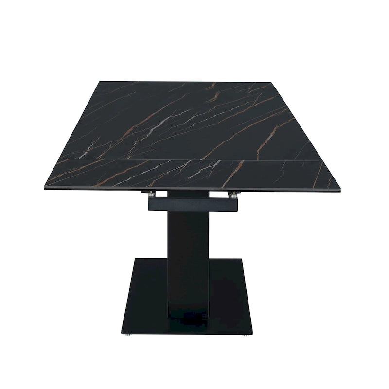 Table extensible en pierre frittée avec piétement en bois et base en verre
