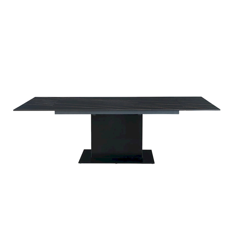 Table extensible en pierre frittée avec piétement en bois et base en verre