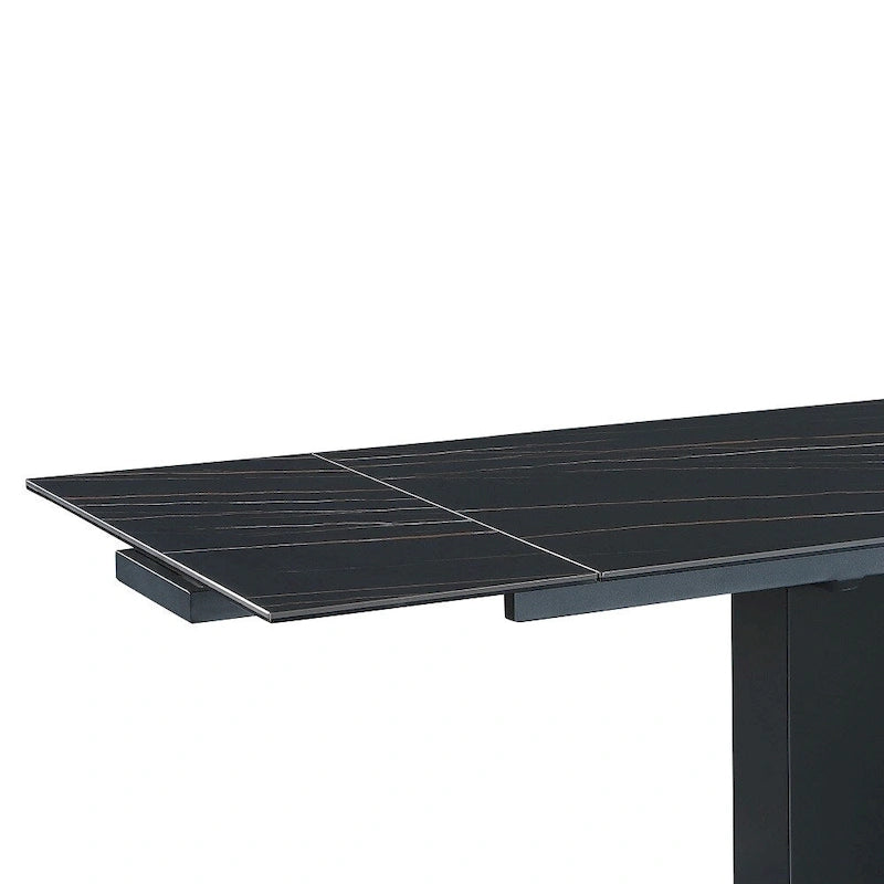 Table extensible en pierre frittée avec piétement en bois et base en verre