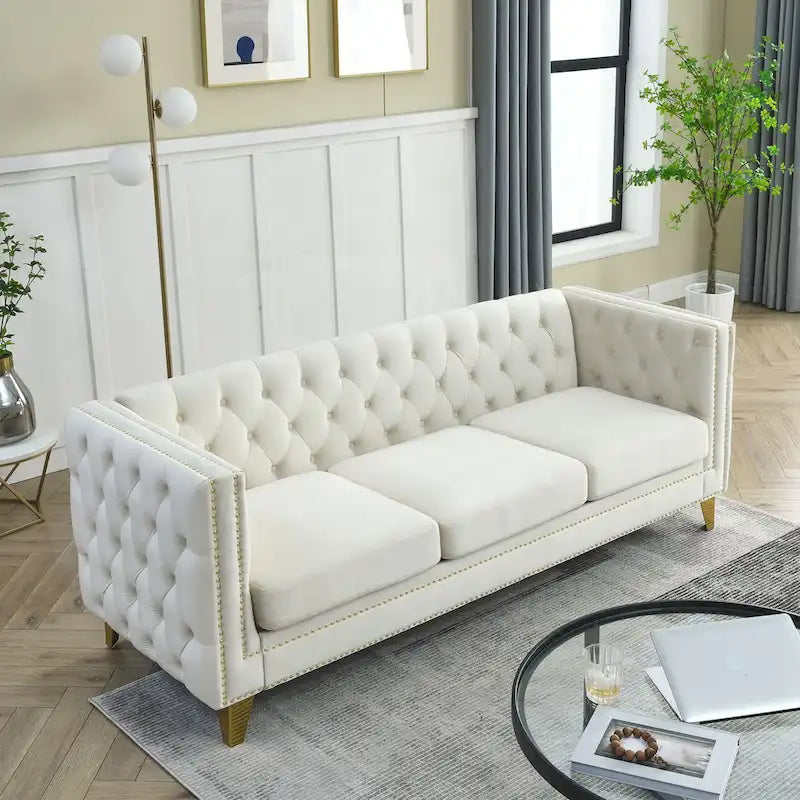 Canapé moderne en velours avec capitonnage et pieds en métal