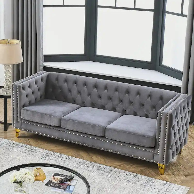 Canapé moderne en velours avec capitonnage et pieds en métal
