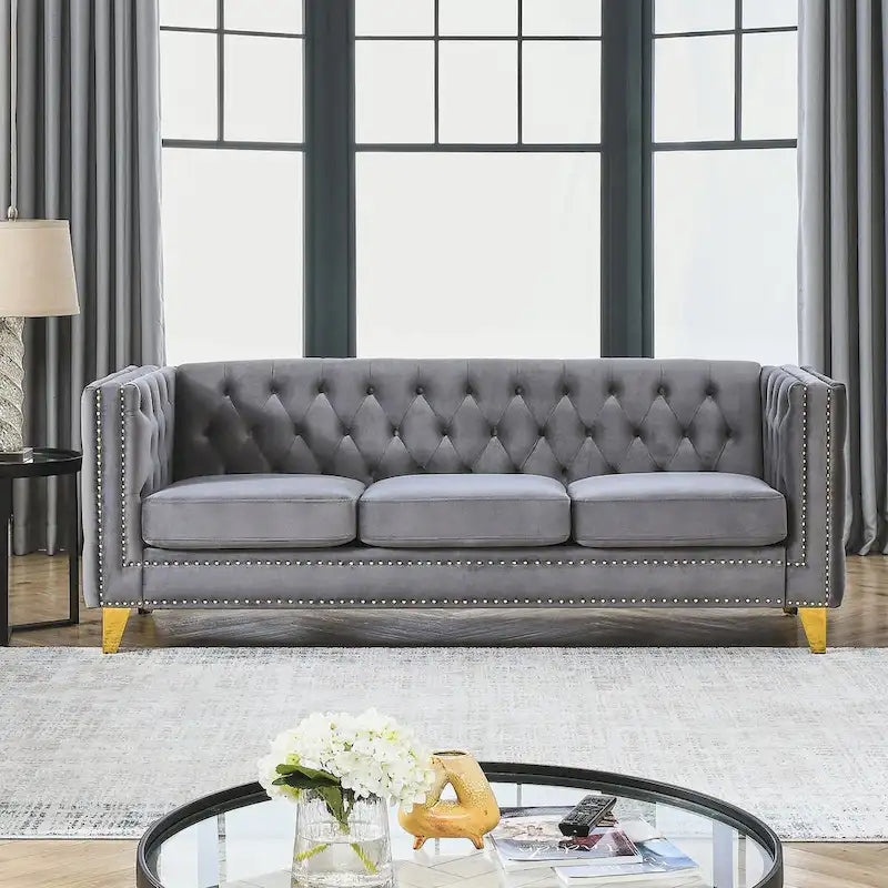 Canapé moderne en velours avec capitonnage et pieds en métal