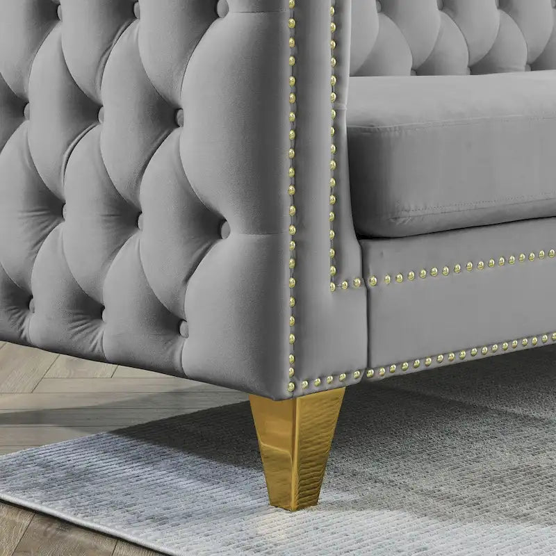 Canapé moderne en velours avec capitonnage et pieds en métal