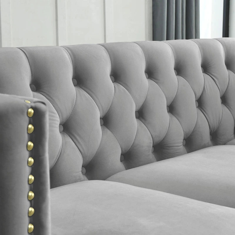 Canapé moderne en velours avec capitonnage et pieds en métal