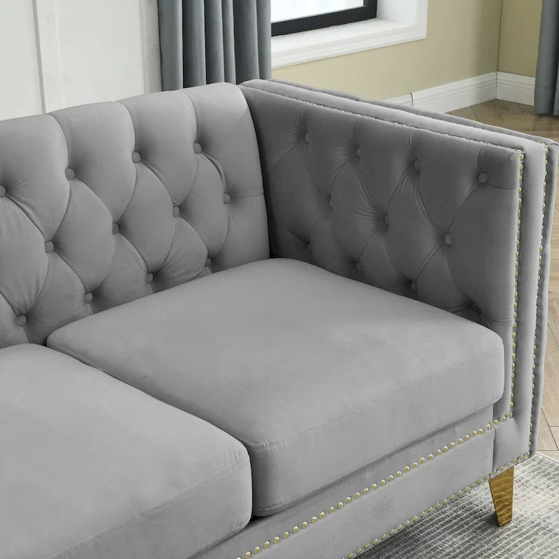 Canapé moderne en velours avec capitonnage et pieds en métal