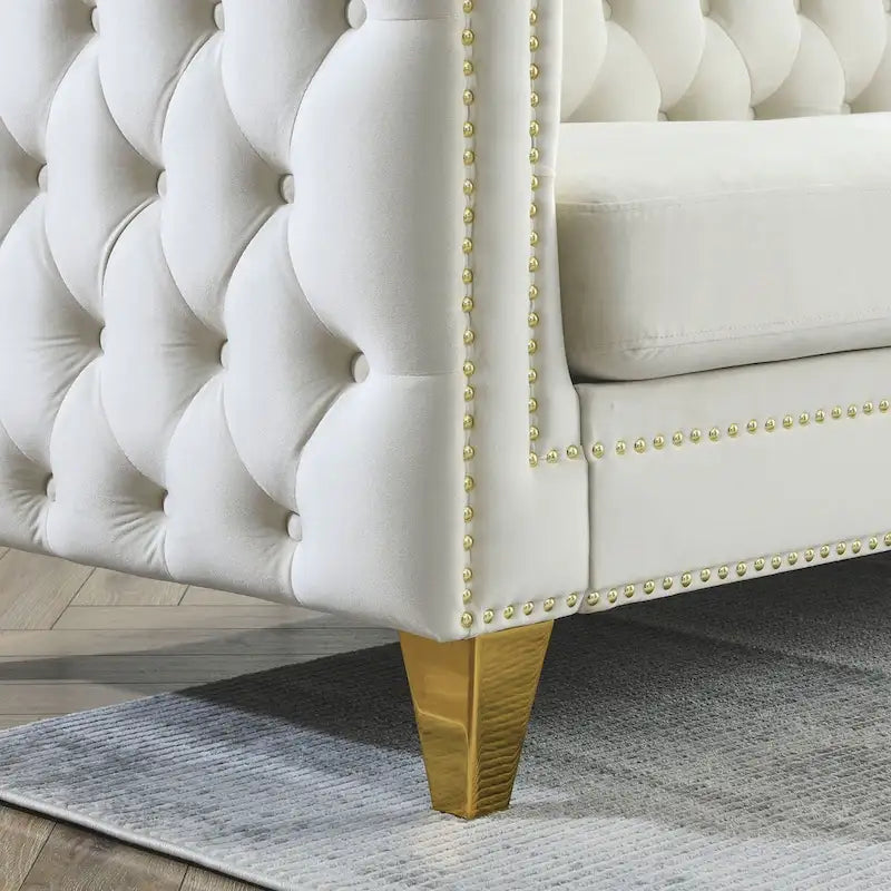 Canapé moderne en velours avec capitonnage et pieds en métal