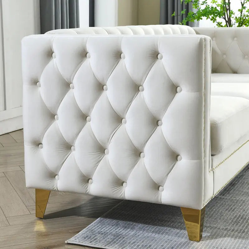 Canapé moderne en velours avec capitonnage et pieds en métal